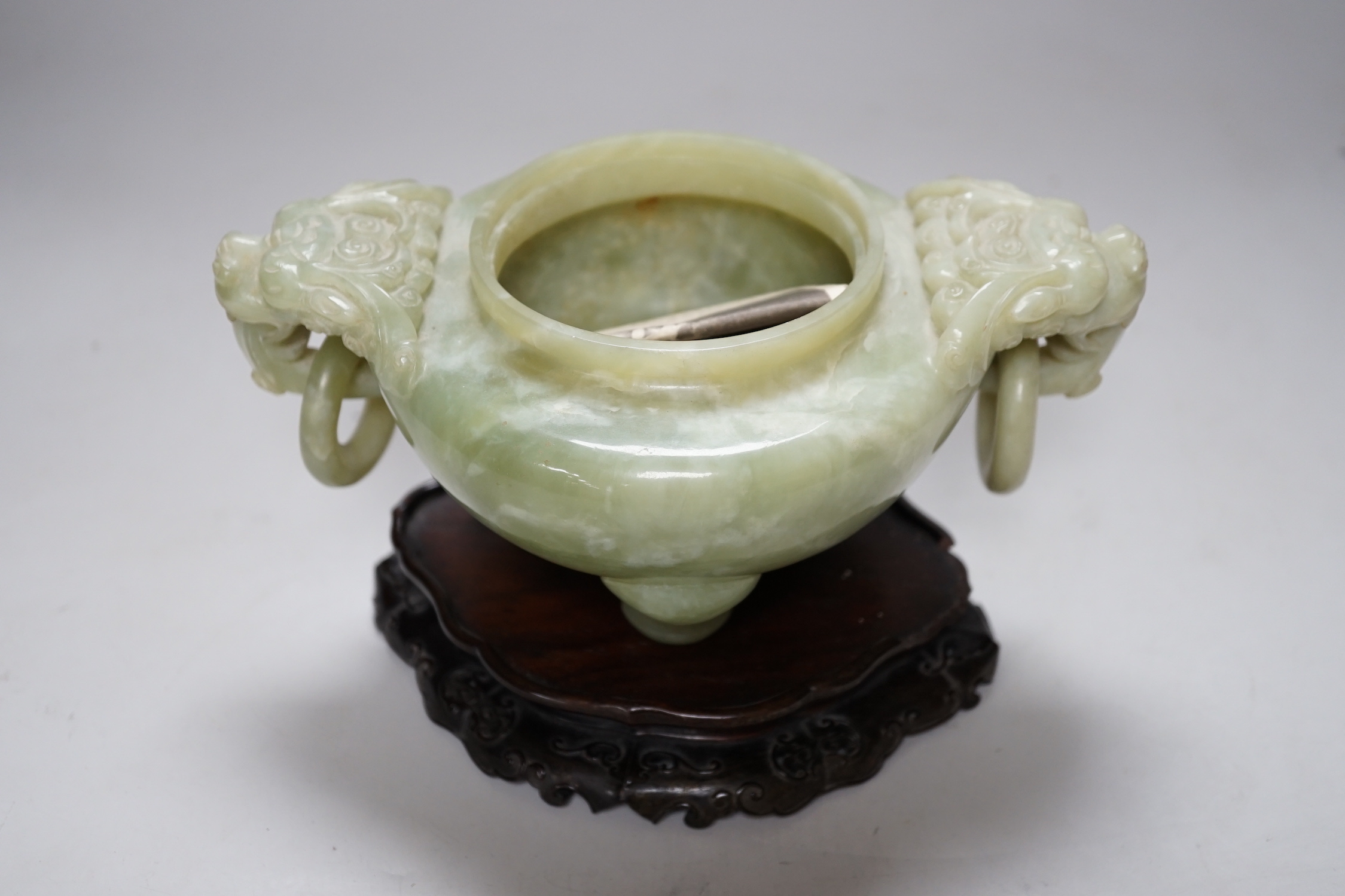 A large Chinese bowenite jade censer and cover on carved hardwood stand, 21cm wide